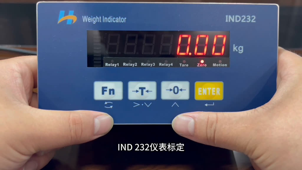 黑色款标定视频片头画面：仪表屏显示 0.00 kg，画面字幕为「IND232 仪表标定」